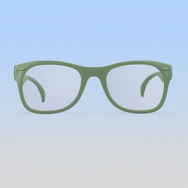 Green eyeglasses on a gradient blue background
