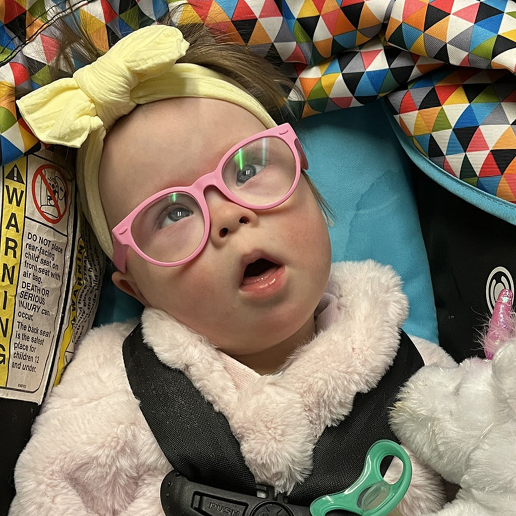 Babies wearing glasses 2025